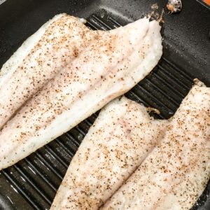 https://jackieunfiltered.com/grilled-lemon-sole-vegan-arugula-basil-walnut-pesto-green-salad-tossed-with-a-green-onion-ginger-vinaigrette/